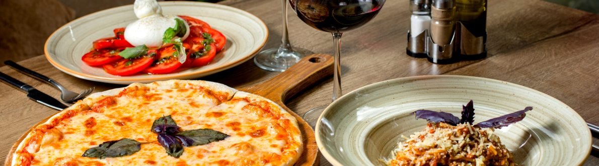 dinner set with margherita pizza salad pasta and wine dinner set with margherita pizza salad pasta and wine